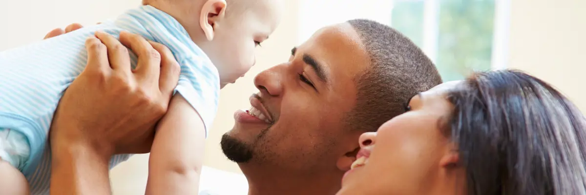 Couple holding a baby