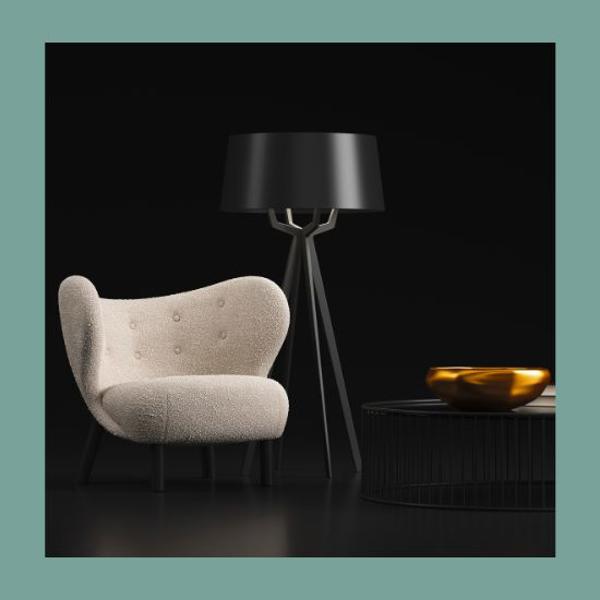 Trendy armchair and lamp on black wall